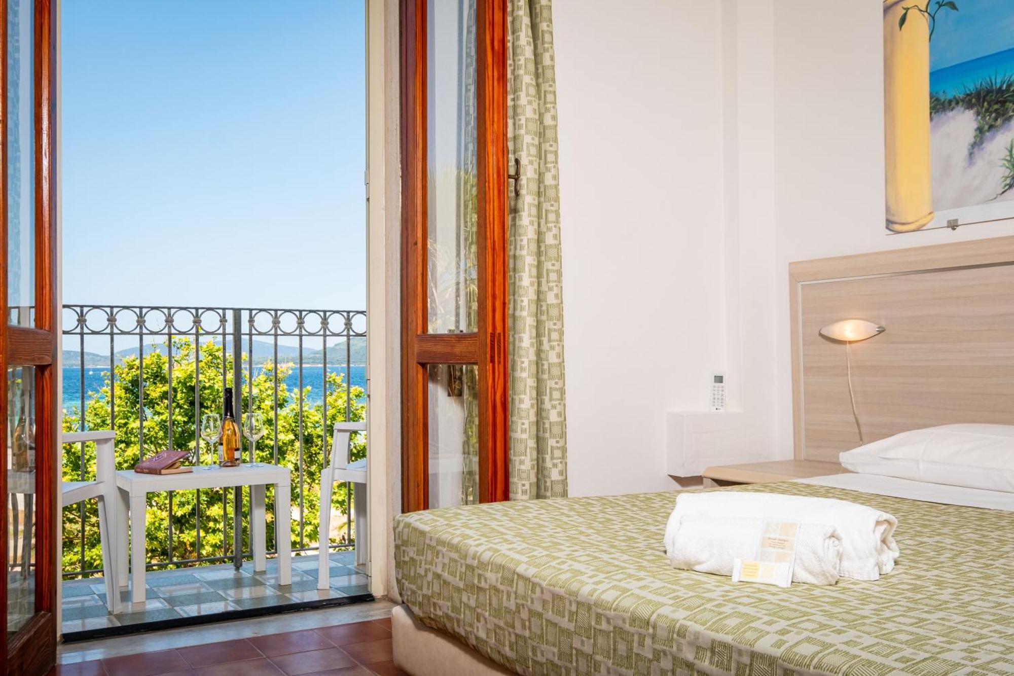 Hotel Il Gabbiano Альгеро Экстерьер фото